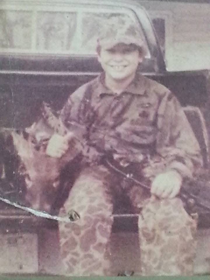 image4 Sean as a kid displaying his deer.